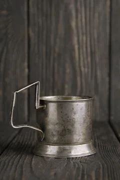 Old cup holder on the table Stock Photos