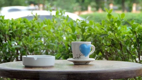 Old cup on table. Video stock 80470219