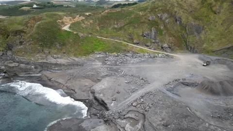 An old but currently in use coal mine in Asturias. Aerial, cyclist lifestyle. Stock Footage 135875627