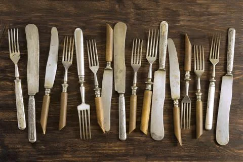 Old cutlery on the table Stock Photos
