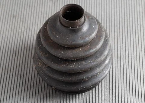 Old CV joint boot providing protection and dirt ingress into the constant Foto stock