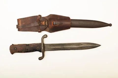 Old dagger with a worn leather sheath Stock Photos