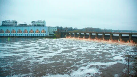 An old dam on the river generates electricity Stock Footage 168816726