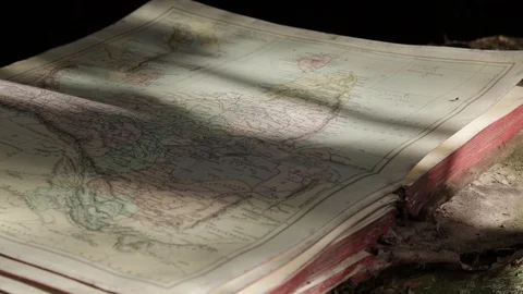 Old Damaged Map Book Open Outside On Rotton Wooden Sill Stock Footage 104200327