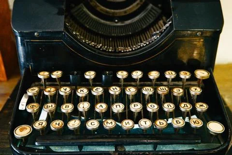 Old damaged typewriter on table Old damaged typewriter on table close-up C... Stock Photos