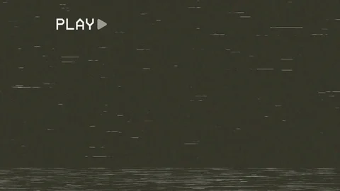 An old damaged VHS tape playing, over noise from an analog TV, with a PLAY text Stock Footage 114744452