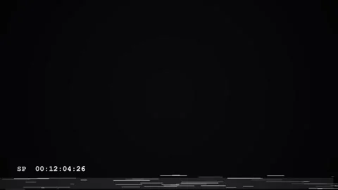 Old damaged VHS tape playing video playback screen with static and timecode Stock Footage 340254435