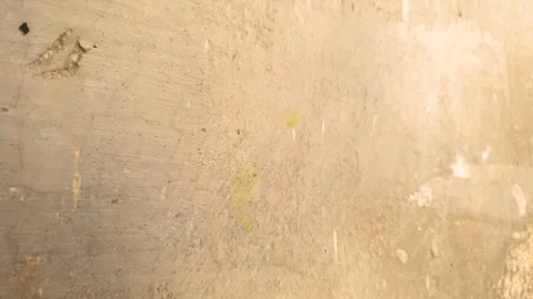 An old, damaged wall with crumbling plaster a damaged surface damaged plaster Stock-Footage 347606571
