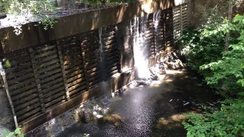Old Damn with Water Flowing Stock Footage 76095243