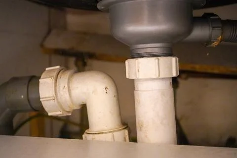 Old damp and dirty pipework Stockfoto's