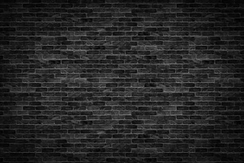 Old dark black brick wall texture background Stock Photos
