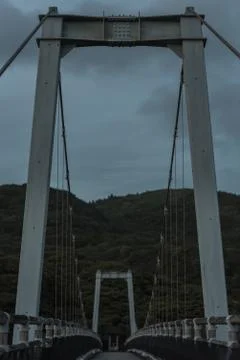 Old Dark Bridge on Cloudy Day Stock Photos