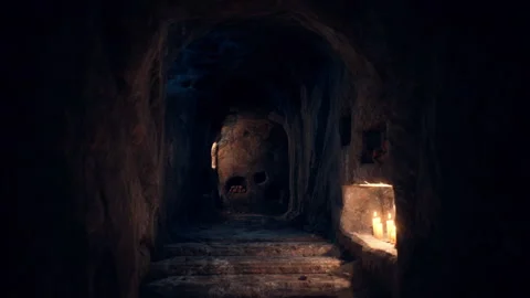 Old dark catacombs with candles Stock-Footage 214215705