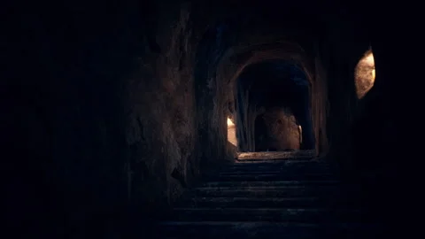 Old dark catacombs with candles Stock-Footage 240945670