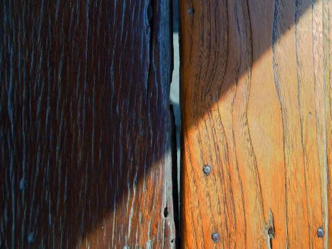 Old dark light diagonal sunlight shade shadow wooden board Foto stock