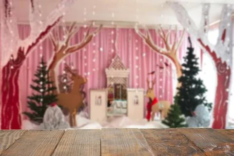 Old Dark wooden rustic table top made of planks with uneven edges on Blurred  Stock Photos