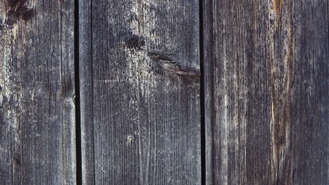 Old darkened from time boards of a table or a wall, a wooden vintage background. Stock Footage 93745800