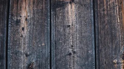 Old darkened from time boards of a table or a wall, a wooden vintage background. Stock Footage 93746284
