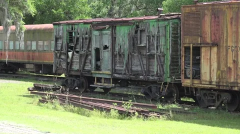 Old Decaying Train Car In Railroad Yard- Video stock 56334229