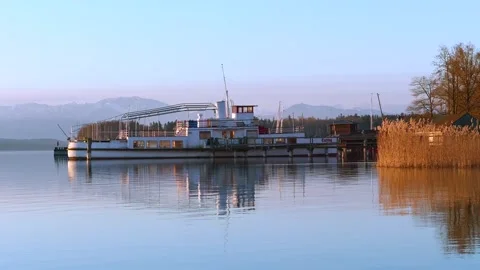 An old, decommissioned excursion boat is reflected in the clear water of La.. Stock Footage 335033067