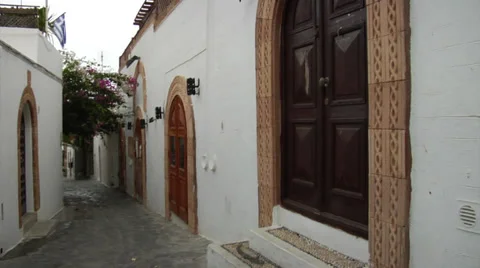 Old decorative stonework framing doors in Lindos, (Rhodes island) Greece Stock-Footage 32348881