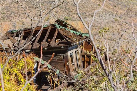 Old derelict housthe that really needs a new roof. Jerome, Arizona. Stock Photos