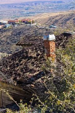 Old derelict housthe that really needs a new roof. Stock Photos