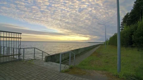 An old deserted concrete pier in the setting sunlight Stock Footage 257774561