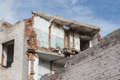 The old destroyed brick multi-storey building Stock Photos