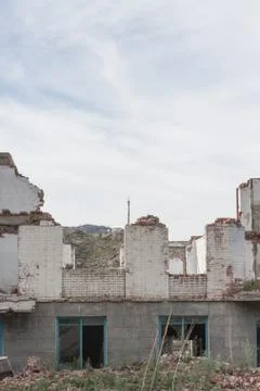 The old destroyed brick multi-storey building Stock Photos