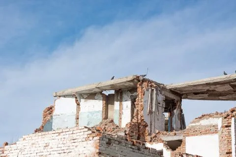 The old destroyed brick multi-storey building Stock Photos