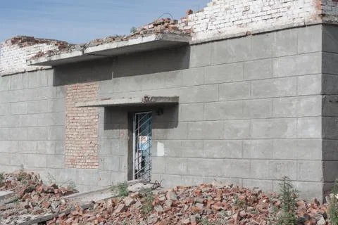 The old destroyed brick multi-storey building Stock Photos