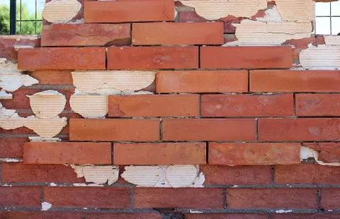 Old destroyed brick wall with cement Stock Photos