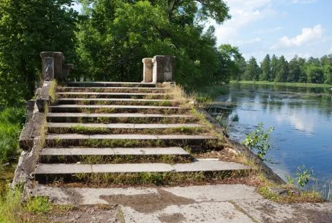 The old destroyed bridge in park Stock Photos