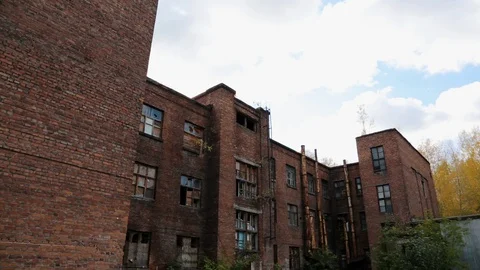 Old destroyed building of Soviet factory in Russia, collapse of production Stock Footage 128283330