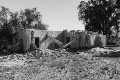 Old destroyed mud brick house (black and white photo) Stock Photos