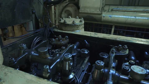 The old diesel engine is running. The motor valves are working. The mechanism in Stock Footage 143708966