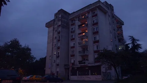 An old dilapidated apartment complex in Russia or Bosnia Herzegovina. 库存影片 75691933