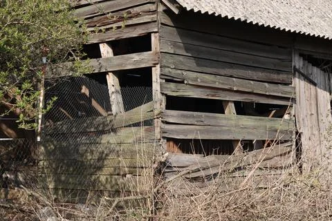 Old, dilapidated barn, boards falling off. Stock Photos
