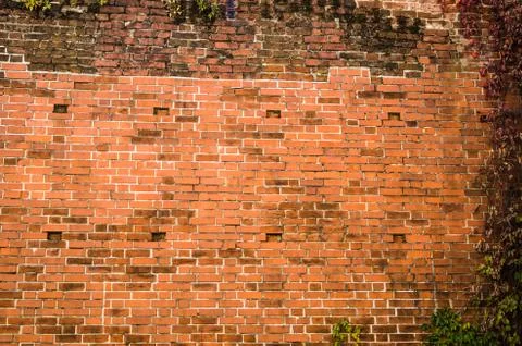 Old dilapidated brick wall of Riga Stock Photos