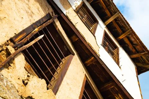 Old dilapidated rustic building facade Stock Photos