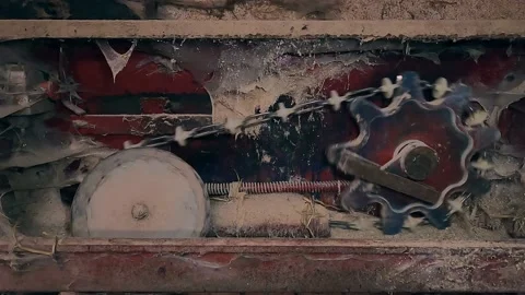 Old dimly lit mechanism for serving food at farm Stock Footage 168644798