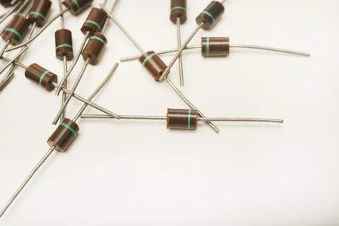 Old diodes. Brown plastic diodes. Old semiconductors with axial leads. Stock Photos