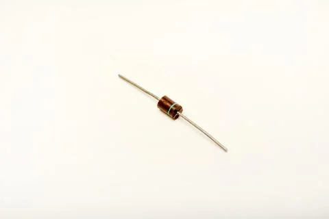 Old diodes. Brown plastic diodes. Old semiconductors with axial leads. Stock Photos