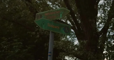 Old directional road sign with arrows in different directions inscriptions in Stock Footage 312004803