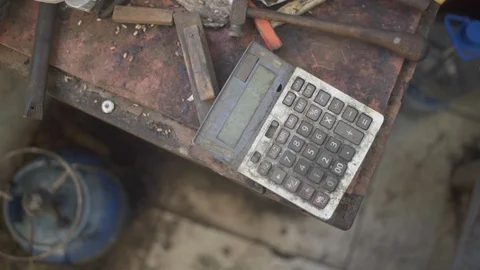 An old, dirty, broken calculator Stock Footage 124652468