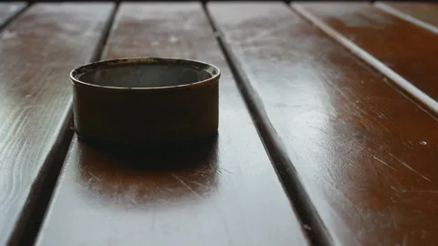 Old dirty can on the table Stock Footage 108637760