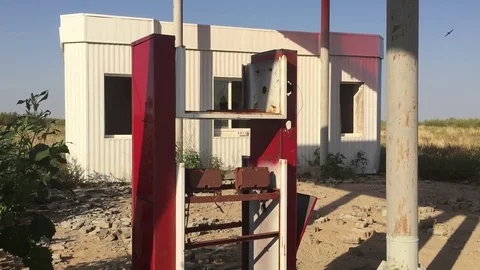 Old dirty gas station road 66. Abandoned gas station end of fuel the world Stock Footage