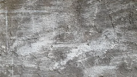 Old dirty plastered surface. Damaged plaster. Artistic background Stock Photos