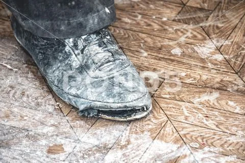 Old dirty ripped shoes Stock Photos
